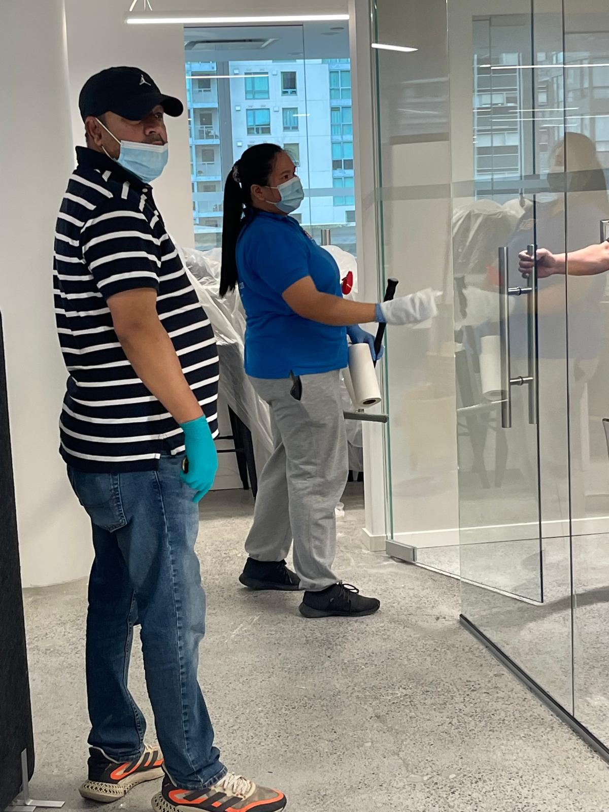 SSA technician finalizing professional window and frame sanitization